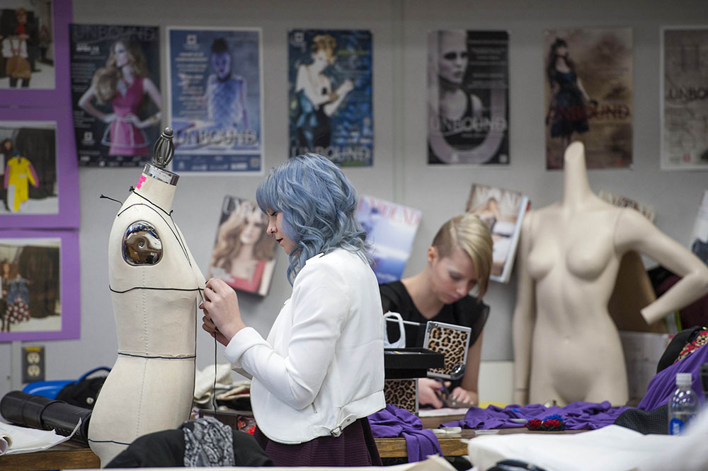 Students working in Fanshawe's Fashion Design Program studio